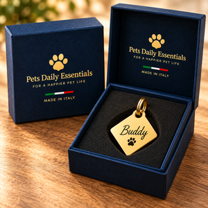 Illustrative Diamond Solid Brass pet ID tag inside navy-and-gold Pets Daily Essentials box with Italian flag